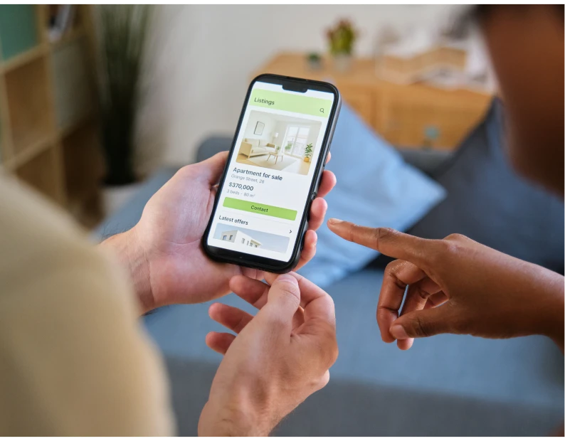 Browsing real estate listings on smartphone