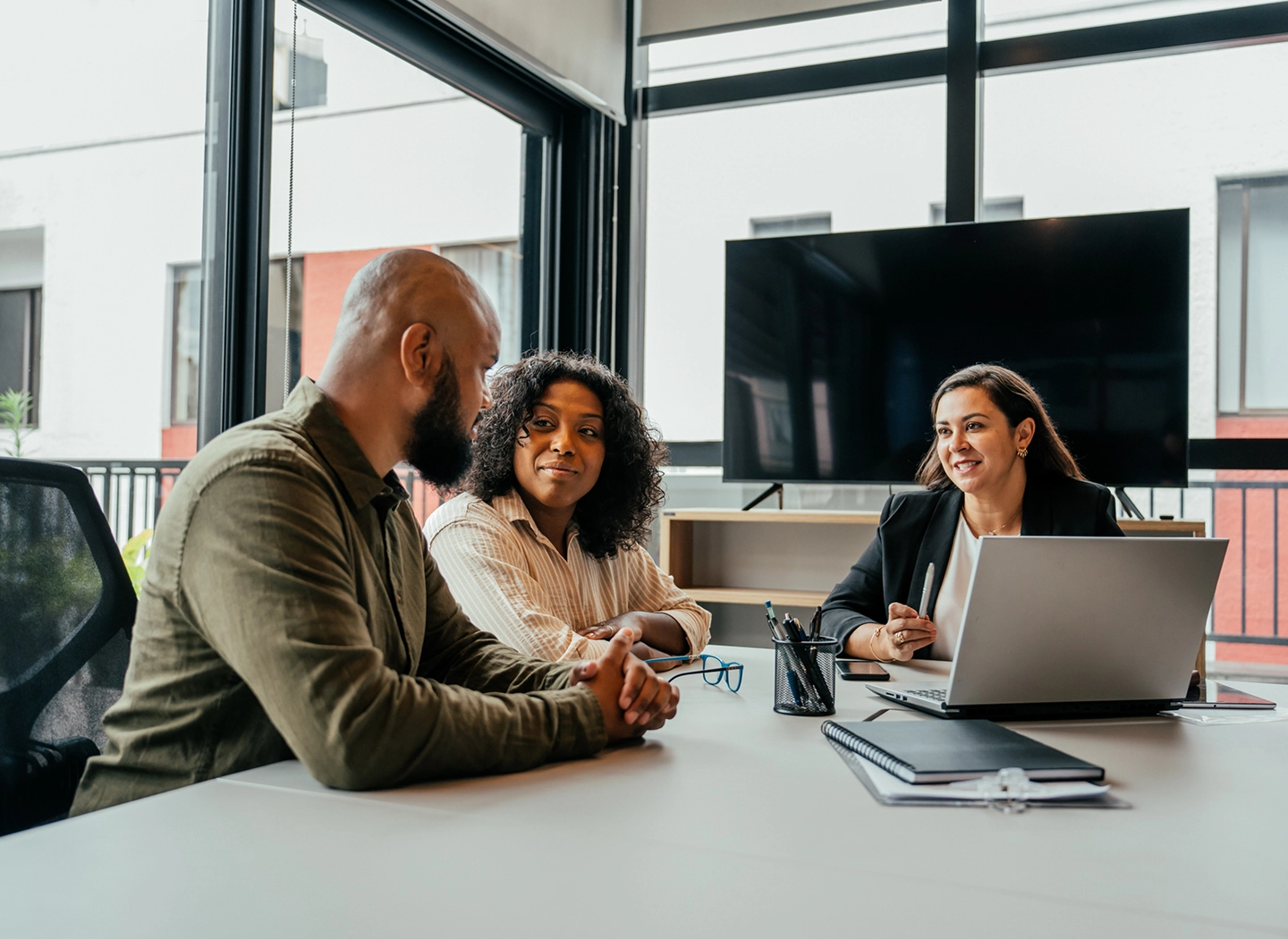 Team collaboration around conference table